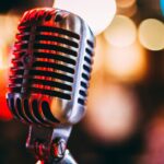 Why Your Podcast Sounds Like a Garbage Disposal (And How a Boom Arm Stand Fixes It)